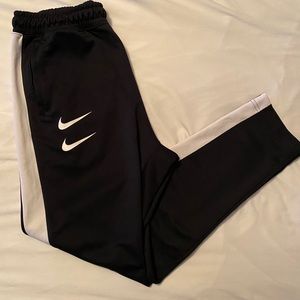 nike swoosh polyknit joggers
